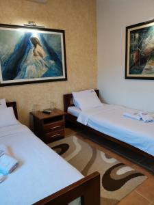Krevet ili kreveti u jedinici u okviru objekta JOKSIM Rooms&Restaurant