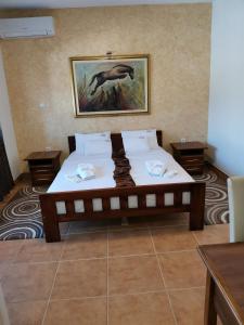 Krevet ili kreveti u jedinici u okviru objekta JOKSIM Rooms&Restaurant