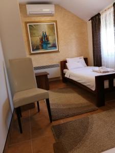 Krevet ili kreveti u jedinici u okviru objekta JOKSIM Rooms&Restaurant