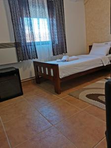 Krevet ili kreveti u jedinici u okviru objekta JOKSIM Rooms&Restaurant