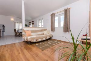 Ένα ή περισσότερα κρεβάτια σε δωμάτιο στο Apartments Family apartments Mila with pool +92 φωτογραφίες