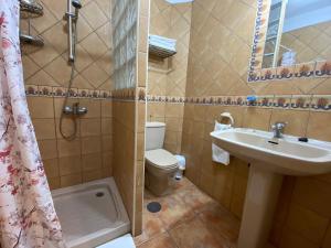 Ванная комната в 100 metros de las mejores playas de los Cristianos +14 фотографий