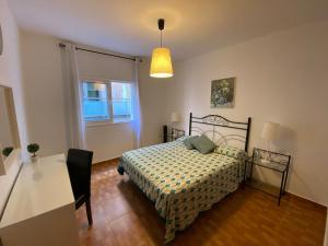 Кровать или кровати в номере 100 metros de las mejores playas de los Cristianos