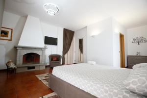 Agriturismo Villa Paradiso Esotico客房内的一张或多张床位