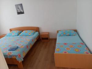 Posteľ alebo postele v izbe v ubytovaní House Slavka