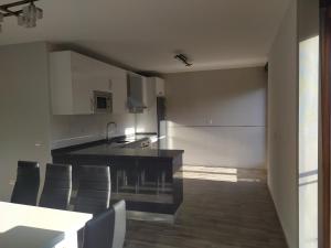 A kitchen or kitchenette at Canadina 2