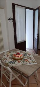 a table with a table cloth on top of it at Ascoli per te in Ascoli Piceno