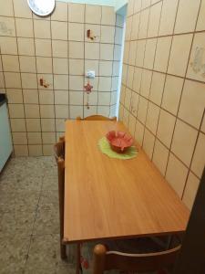 a table in a kitchen with a bowl on it at numero uno in Lido di Jesolo