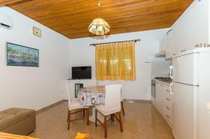 Kuchyň nebo kuchyňský kout v ubytování Apartments Marinko