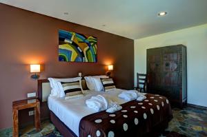 
Uma cama ou camas num quarto em Hotel Rural Monte Xisto
