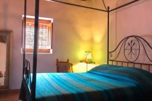 A bed or beds in a room at CASA IBICENCA EN CALA D´HORT