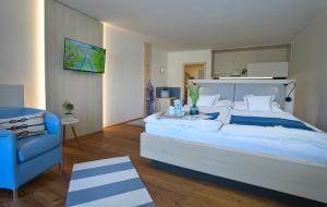 Postelja oz. postelje v sobi nastanitve Frauscher Hafen-Apartments