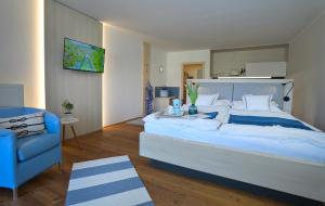 Posteľ alebo postele v izbe v ubytovaní Frauscher Hafen-Apartments