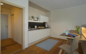 Kuchyňa alebo kuchynka v ubytovaní Frauscher Hafen-Apartments