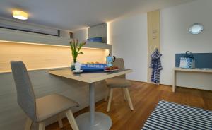 Fotografia z galérie ubytovania Frauscher Hafen-Apartments v destinácii Gmunden