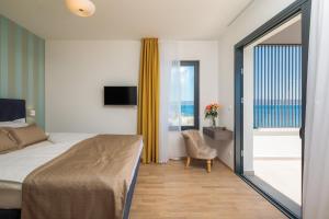 Posteľ alebo postele v izbe v ubytovaní Villa Four Brothers - Penthouse Suite