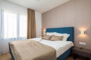 Posteľ alebo postele v izbe v ubytovaní Villa Four Brothers - Penthouse Suite