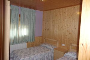 Posteľ alebo postele v izbe v ubytovaní CASA RURAL JAVIER EL BALCÓN APARTAMENTO 6 PERSONAS