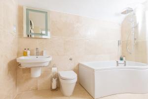 
A bathroom at 16 Lansdown -By Luxury Apartments
