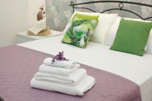 Postel nebo postele na pokoji v ubytování PONTE VALLE B&B POMPEI