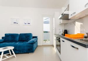 Kuchyň nebo kuchyňský kout v ubytování Apartments and Rooms Bianca