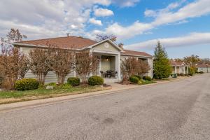 a house on the side of the road at Two Bedroom Villa in the Heart of Branson! in Branson