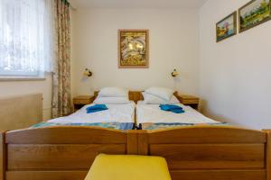 Posteľ alebo postele v izbe v ubytovaní Apartments Villa 7