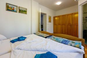 Posteľ alebo postele v izbe v ubytovaní Apartments Villa 7