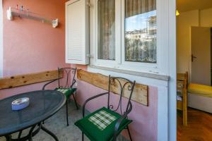 Posedenie v ubytovaní Apartments Villa 7