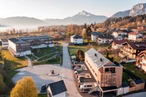 an aerial view of a small town with a park at HIMMELBLAU - Design Apartment am Mondsee in Mondsee