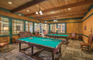 a billiard room with two pool tables in it at Club Wyndham Governors Green in Williamsburg