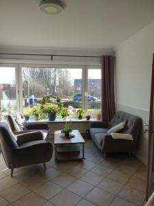 Posezení v ubytování Hotel Garni Haus Dithmarschen