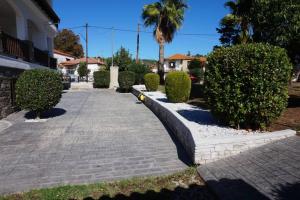 A garden outside katerina's Villa