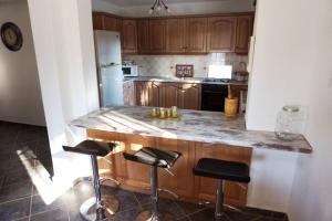 A kitchen or kitchenette at katerina's Villa