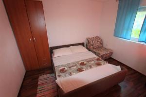 Postel nebo postele na pokoji v ubytování Apartments Tajci