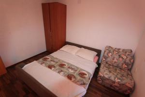 Postel nebo postele na pokoji v ubytování Apartments Tajci