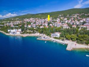 an aerial view of a town on the shore of the water at Apartments Danica in Dramalj