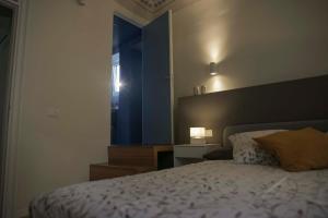 Posteľ alebo postele v izbe v ubytovaní Turna Apartment