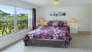a bedroom with a bed and a large window at !NEW! Villa Rosa & Lucia in Cape Coral +35 photos
