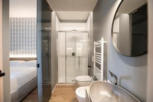 Koupelna v ubytování RICCIONE SUITE DESIGN