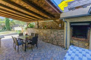 Patio nebo venkovní prostory v ubytování Villa Drago