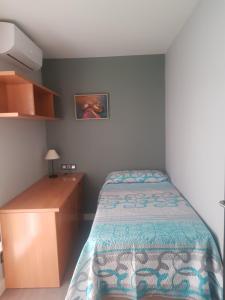 Posteľ alebo postele v izbe v ubytovaní Burriana Centro