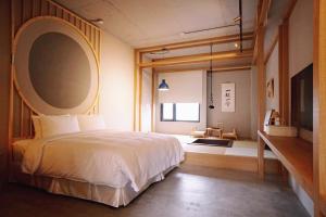 Letto o letti in una camera di Thinker Hotel