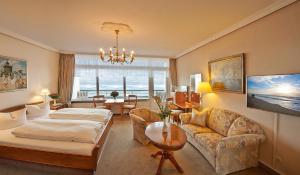 Postel nebo postele na pokoji v ubytování Strandhotel Monbijou GmbH garni