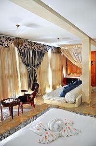 Postel nebo postele na pokoji v ubytování Palais Ommeyad Suites & Spa