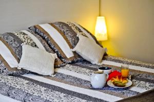 Postel nebo postele na pokoji v ubytování Hôtel Oxo