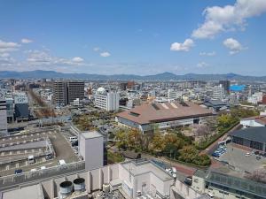 an aerial view of a city with buildings at JR Hotel Clement Tokushima in Tokushima
