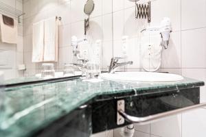Koupelna v ubytování Hotel Münchwilen
