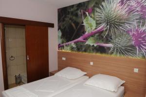 Postel nebo postele na pokoji v ubytování Guest House Ostojić + 17 fotografií