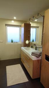 Ett badrum på Hoamatl, Appartement